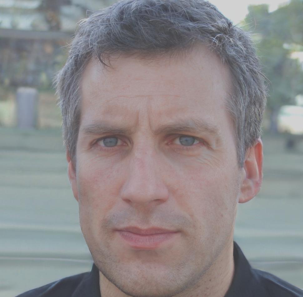 Portrait de Marc Dubois, participant satisfait du programme